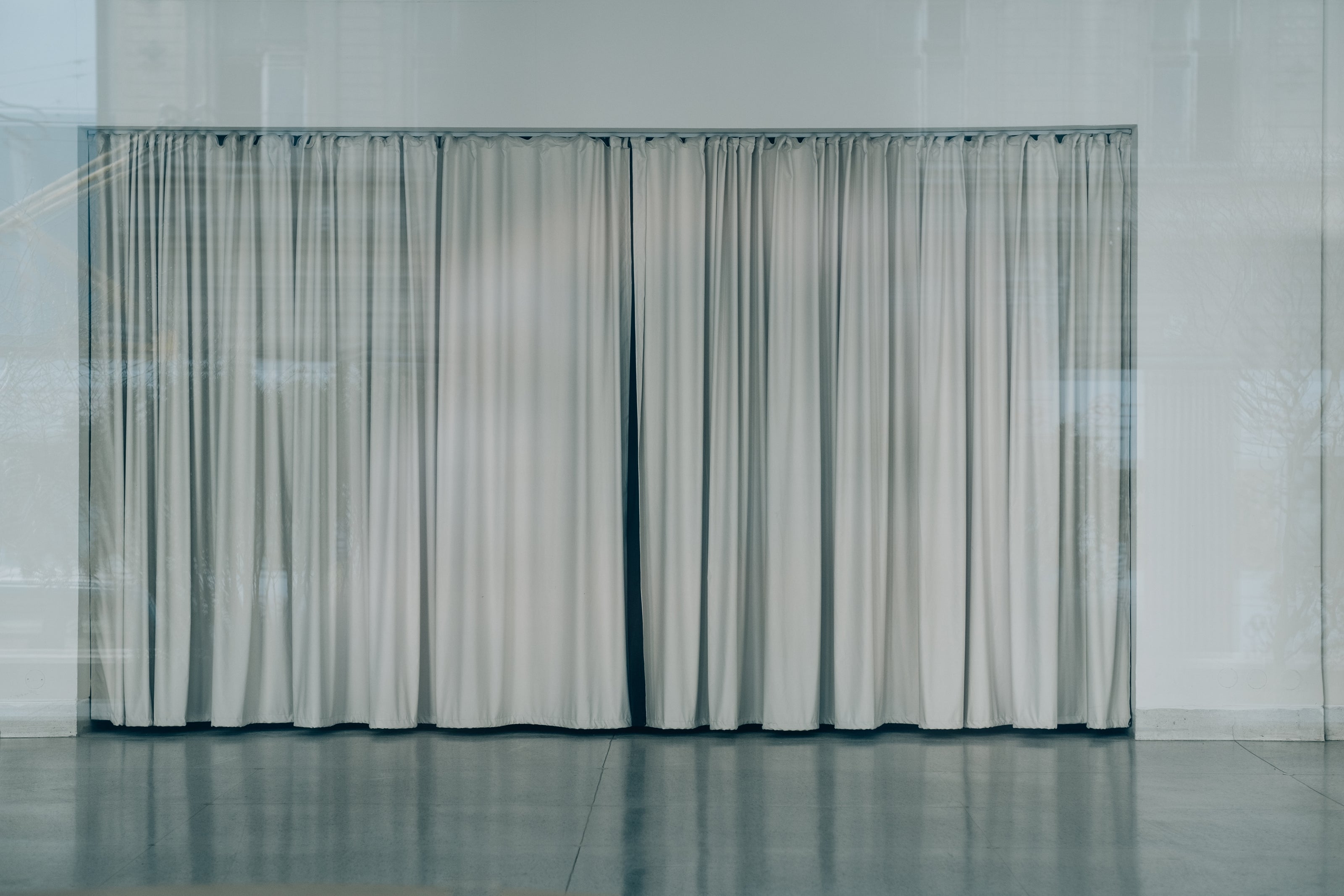 Sheer curtains photographed from outside